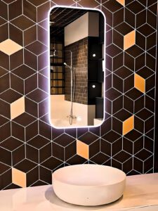 Luxury LED mirror in a high-end bathroom makeover design.